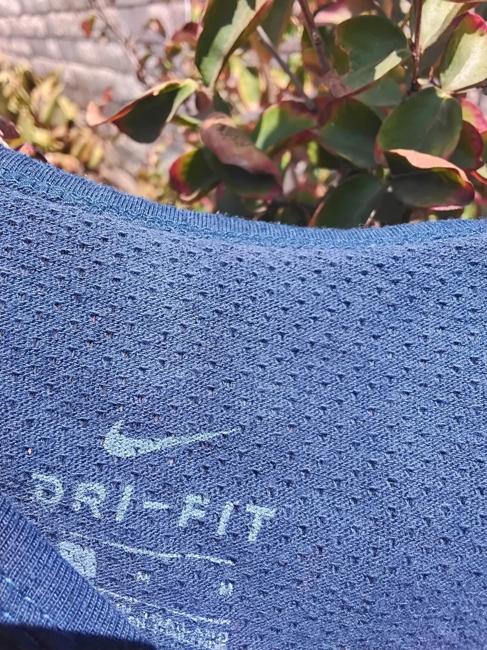 Nike Wonen's Navy Blue Sleeveless Tank with Orange Swoosh